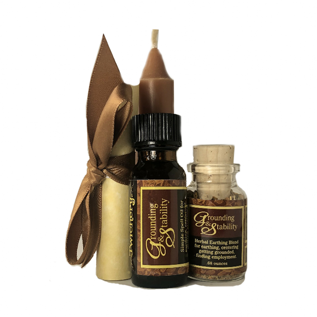 A spell kit for employment and stability consisting of a small bottle labeled 'Grounding Stability', a jar of herbal blend, and a brown candle, all tied together with a ribbon.