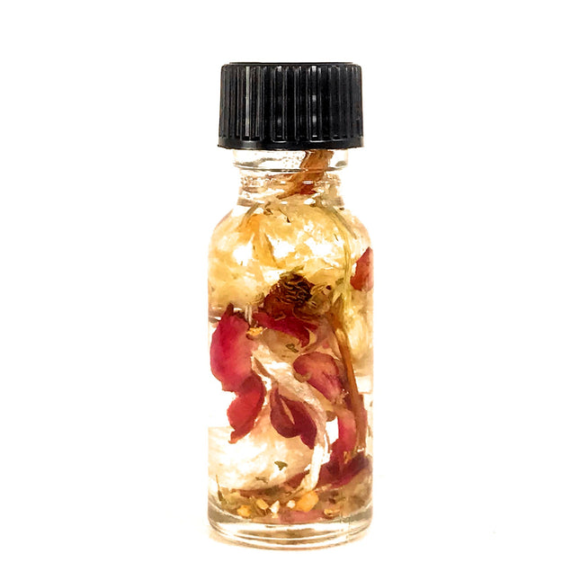 .5 ounce bottle with black cap containing dried flowers in Saint Martha Ritual Oil