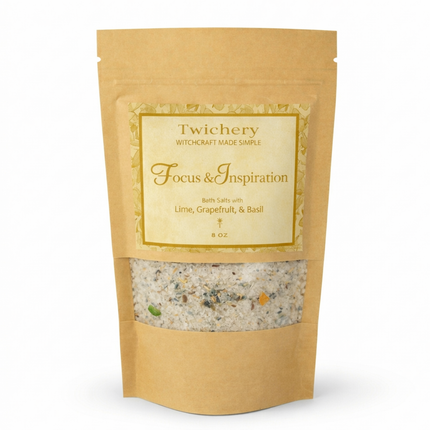 Kraft paper pouch of Twichery Focus & Inspiration Bath Salts on a white background, with herbal bath salts visible through the window and a golden label displaying the Twichery Authenticity Sigil.
