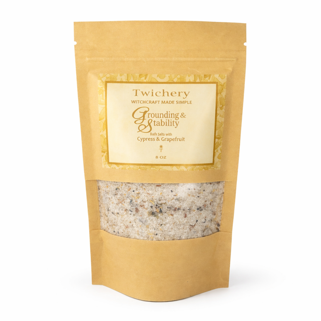 Kraft paper pouch of Twichery Grounding & Stability Bath Salts on a white background, with herbal bath salts visible through the window and a golden label displaying the Twichery Authenticity Sigil.