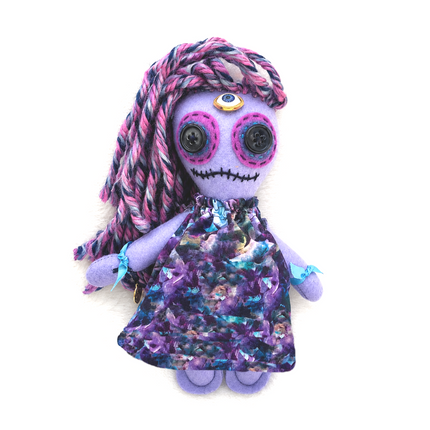 purple themed hoodoo doll with purple and pink hair and a colorful dress on a white background
