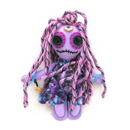 Purple themed hoodoo psychic enhancement doll with braided hair on a white background