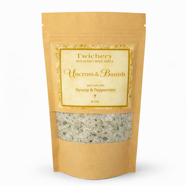 Kraft paper pouch of Twichery Uncross & Banish Bath Salts on a white background, with herbal bath salts visible through the window and a golden label displaying the Twichery Authenticity Sigil.