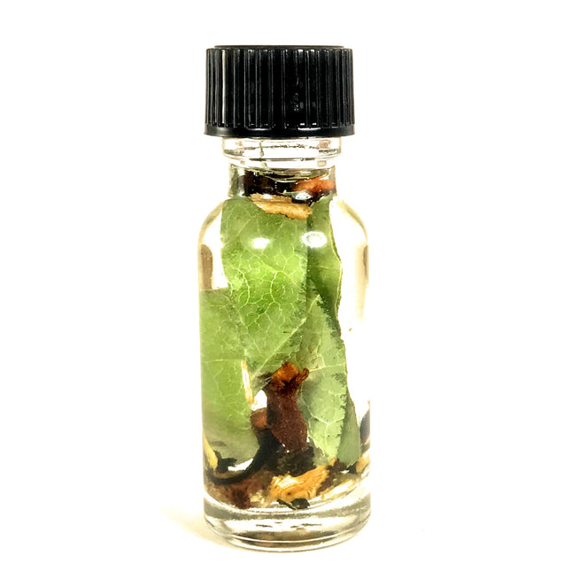 .5 ounce bottle of Twichery Domination Oil with herbs and essential oils for gaining dominion over others.