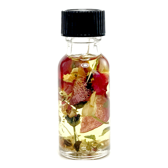 .5 ounce bottle of Follow Me Boy Ritual Oil, containing herbs, essential oils, and flower petals for faithfulness, honesty, loyalty.