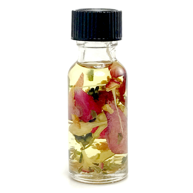 .5 ounce bottle of Follow Me Girl Ritual Oil with herbs, essential oils, and flower petals for loyalty and fidelity. 